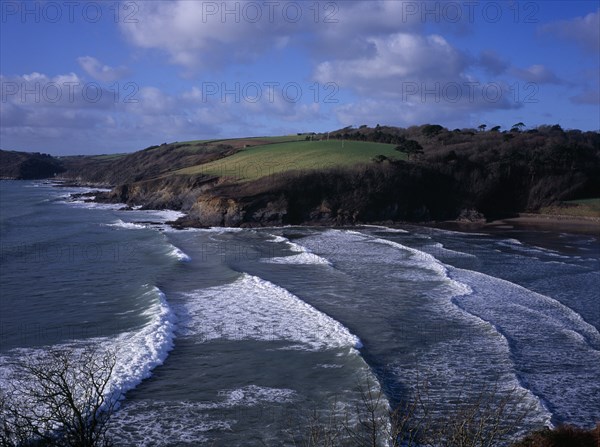 ENGLAND, Cornwall, Porthluney Cove, "Sea and coastline west of Dodman Point.  Sheltered, sandy cove with trees and fields sloping away to cliffs."