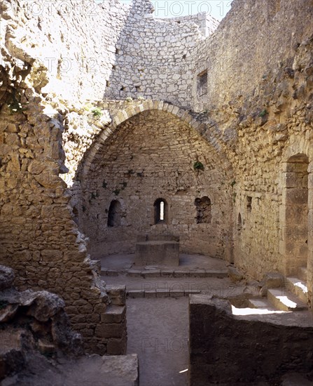 FRANCE, Languedoc-Roussillon, Aude, Chateau Peyrepertuse.  Ruined medieval Cathar castle stronghold.  St Mary’s Chapel and altar.