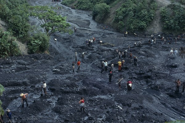 COLOMBIA, Industry, Mining Emeralds, Muzo Emerald Mine in Cordillera Oriental of Colombian Andes. View over guaceros  illegal workers searching in slurry washed down from main mine above  to find emeralds missed by the official syndicate miners.