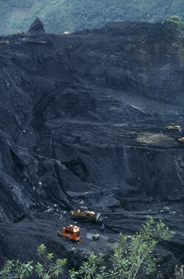 COLOMBIA, Industry, Mining Emeralds, Muzo Quipama Emerald Mine earth moving equipment belonging to the official syndicate  excavate the shales to reach a veta - emerald vein