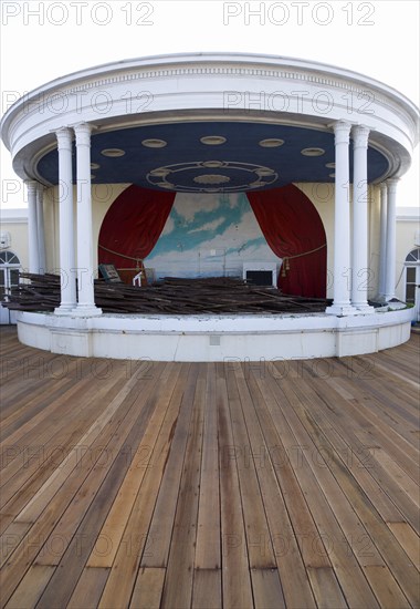 ENGLAND, West Sussex, Worthing, New decking with the bandstand full of old planks the day timber was washed up on the beach from the Greek registered Ice Princess which sank off the Dorset coast on 15th January 2008