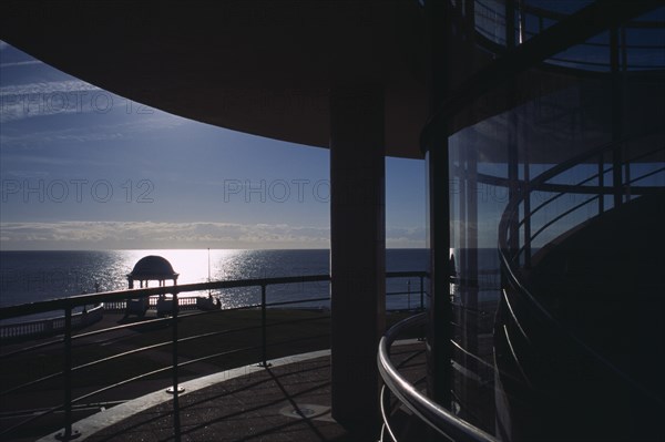 ENGLAND, East Sussex, Bexhill-on-Sea, De La Warr Pavilion exterior. View towards the sea from  sun terrace by the staircase section