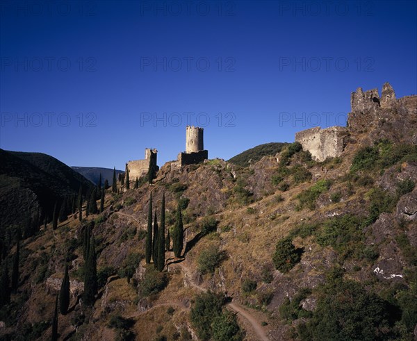 FRANCE, Languedoc-Roussillon, Aude, "Chateaux de Lastours. Cathar castles.  From left to right Chateau Cabaret (mid-eleventh century), Tour Regine (added after 1240), and Surdespine (1153)"