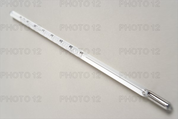 SCIENCE, Medical, Measurement, White mercury thermometer showing temperature scale and rising mercury level