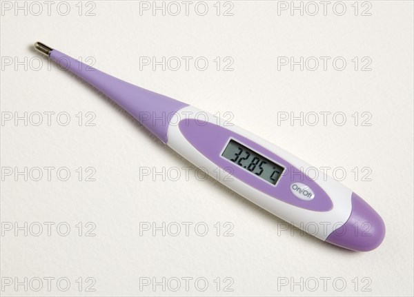 MEDICAL, Health, Measurement, Purple digital thermometer showing scale reading in degrees celcius