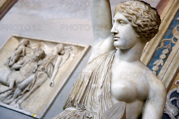 ITALY, Lazio, Rome, Vatican City Museum Belvedere Palace Statue of a woman with raised arm in the Roman and Greek art collection