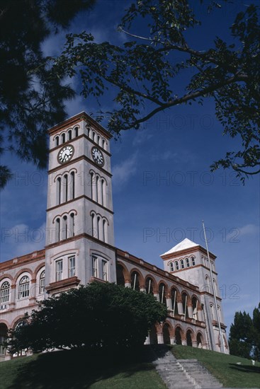 BERMUDA, Hamilton, "Sessions House Supreme Court building, exterior part framed by trees."