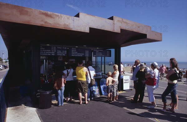 ENGLAND, West Sussex, Littlehampton, "People queuing at the East Beach Cafe, a seafront structure designed by Thomas Heatherwick"