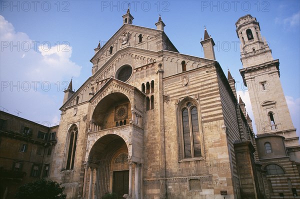 ITALY, Veneto, Verona, Romanesque facade of Duomo Santa Maria Matricolare and bell tower at side.  Dating from the twelth century with Romanesque portal carved by Nicolo.