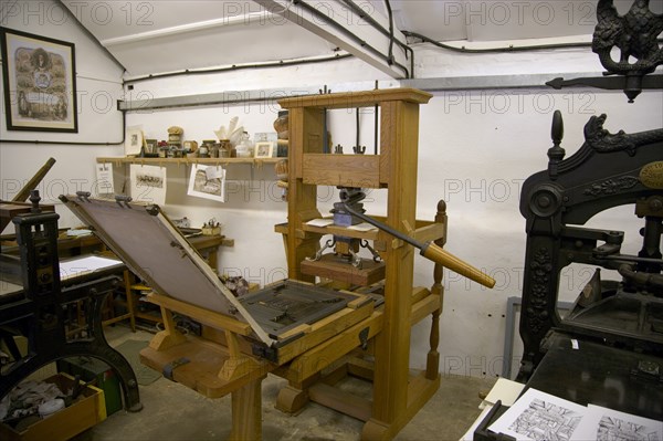 ENGLAND, West Sussex, Amberley, Amberley Working Museum. The Print Workshop with a collection of printing machinery and typecasters