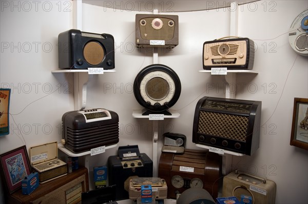 ENGLAND, West Sussex, Amberley, Amberley Working Museum. The Vintage Wireless Exhibition with display of domestic radio equipment