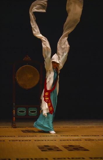 SOUTH KOREA, Seoul, "Buddhist drum dance adapted for National Theatre performance.  Also found in kisaeng houses, which resemble the geisha houses of Japan.  Highly developed art form of fluid movement and never static."
