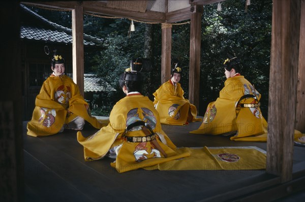 JAPAN, Honshu, Kyoto, "Sagimori Shrine.  Bugaku has been preserved for over a thousand years by courtiers of the Imperial Palace, normally performed exclusively by men, these girls dressed in traditional yellow costume, are amateurs performing the old dances chiefly for their own amusement. "