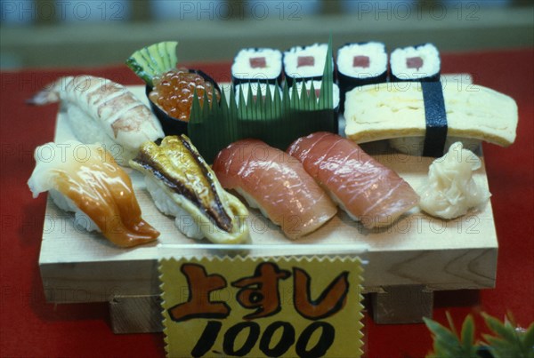 JAPAN, Markets, Food and Drink, Window display of plastic sushi.