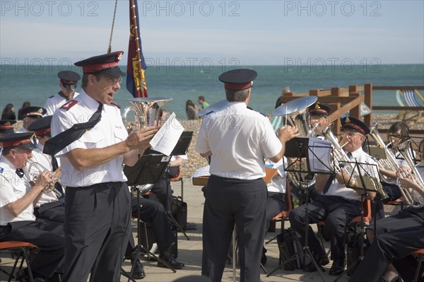 ENGLAND, West Sussex, Worthing, The Salvation Army band playing on the seafront