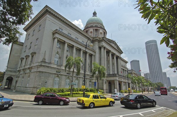 SINGAPORE, Downtown, Old colonial building with new high rise buildings in the background.