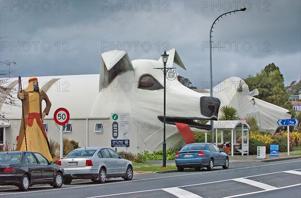 NEW ZEALAND, NORTH ISLAND, WAIKATO, "TIRAU, A CORRUGATED IRON SHEPERD LEFT AT THE ENTRANCE TO TIRAU CO-OPERATING CHURCH NEXT TO A SHEEPDOG CENTRE WHICH IS THE TOWNS TOURIST INFORMNATION CENTRE AND WOOL SHOP IN THE SHAPE OF A SHEEP RIGHT OFF MAIN STREET IN TIRAU TOWN, SOUTH WAIKATO,"