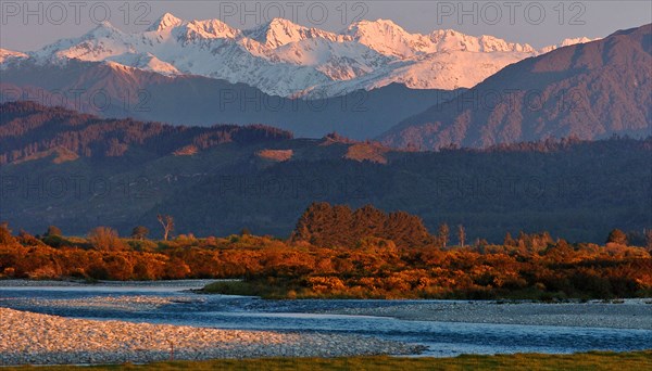 NEW ZEALAND, SOUTH ISLAND, WEST COAST, "HOKITIKA, VIEW INLAND FROM THE WEST COASTAL ROUTE 6 THE KUMARA JUNCTION HIGHWAY NORTH OF HOKITIKA SHOWING THE SOUTHERN ALPS IN THE DISTANCE."