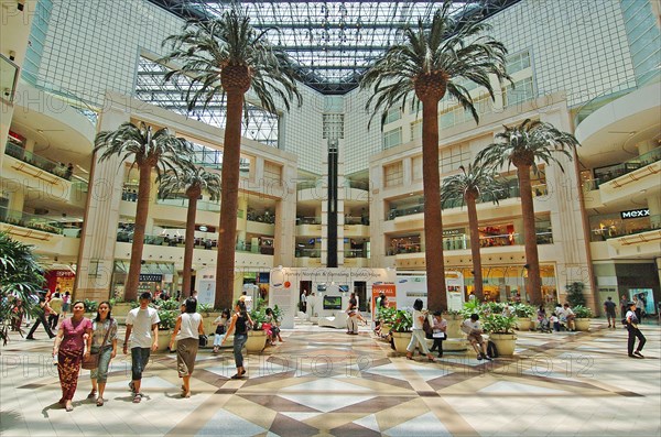 SINGAPORE, CIVIC DISTRICT , Raffles City, "INTERIOR VIEW OF THE RAFFLES CITY SHOPPING MALL .Raffles City shopping mall is a large complex located in the Civic District within the Downtown Core of the city-state of Singapore. Occupying an entire city block bounded by Stamford Road, Beach Road, Bras Basah Road and North Bridge Road, it houses two hotels and an office tower over a podium which contains a shopping mall and a convention centre"