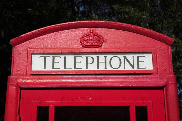 USA, Florida, Orlando, Walt Disney World Resort. Red telephone box in the  English section of EPCOT Center World Showcase.