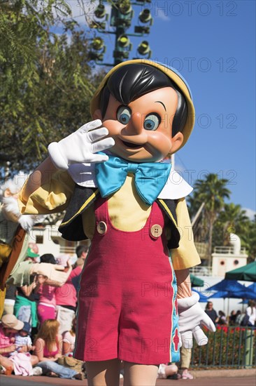 USA, Florida, Orlando, Walt Disney World Resort. Disney MGM Studios. Pinocchio character during the Stars and Motor Cars Parade.