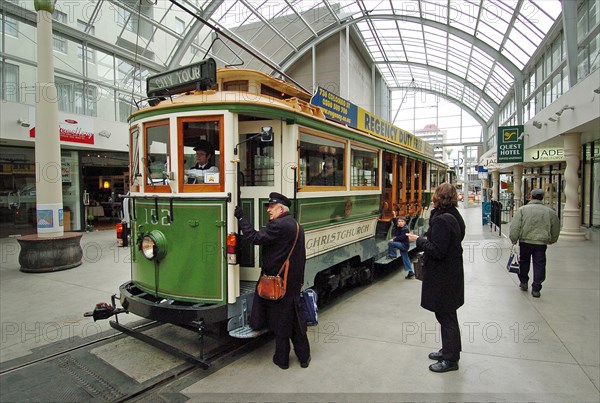 NEW ZEALAND, SOUTH ISLAND, CHRISTCHURCH, "CANTERBURY, CITY TOUR TRAMS AT A TRAM STOP IN WORCESTER STREet."