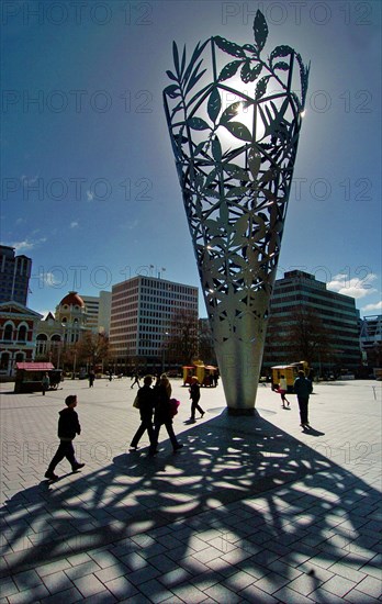 NEW ZEALAND, SOUTH ISLAND, CHRISTCHURCH, "CANTERBURy, SILHOETTE OF MILLENNIUM SCULPTURE IN CATHEDRAL SQUARE"