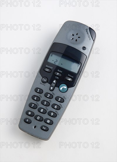 COMMUNICATIONS, Telephone, Cordless, DECT telephone handset with green answer button. Digital Enhanced Cordless Telecommunications