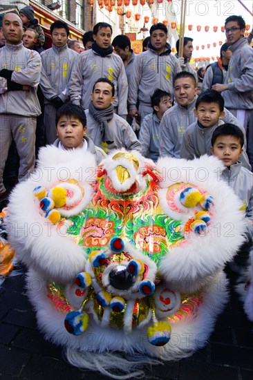 ENGLAND, London, Chinatown, Lion Dance troupe performing in Gerrard Street during Chinese New Year celebrations in 2006 for the coming Year of The Dog