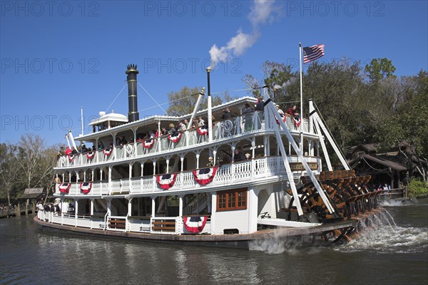 USA, Florida, Orlando, "Walt Disney World Resort. Liberty Belle Paddle Steamer, Liberty Square Riverboat on a lake in the Magic Kingdom."