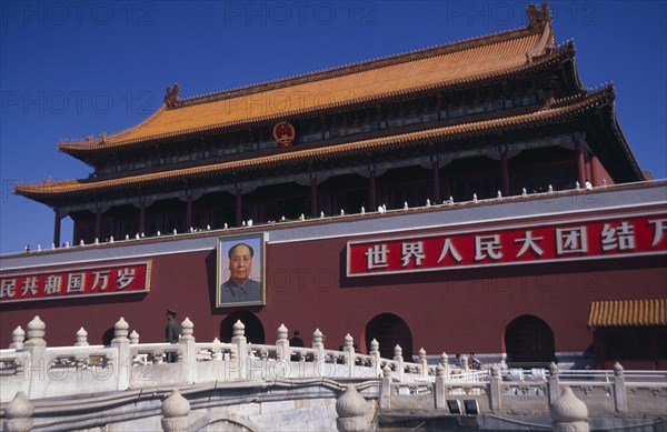 CHINA, Beijing, Entrance gateway to the Forbidden City from Tiananmen Square with portrait of Mao on exterior wall.