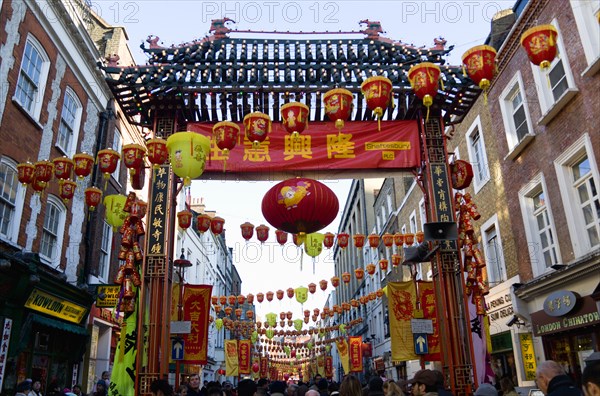 ENGLAND, London, Chinatown, Lion Dance troupe in Gerrard Street with their lions before performing through the area during Chinese New Year celebrations in 2006 for the coming Year of The Dog