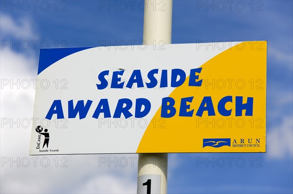 ENGLAND, West Sussex, Littlehampton, Seafront sign of a Seaside Award Beach from the Encams Keep Britain Tidy campaign on the seafront promenade