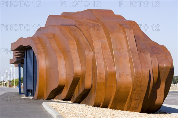 ENGLAND, West Sussex, Littlehampton, The rusted metal structure of the fish and seafood restaurant the East Beach Cafe designed by Thomas Heatherwick on the promenade