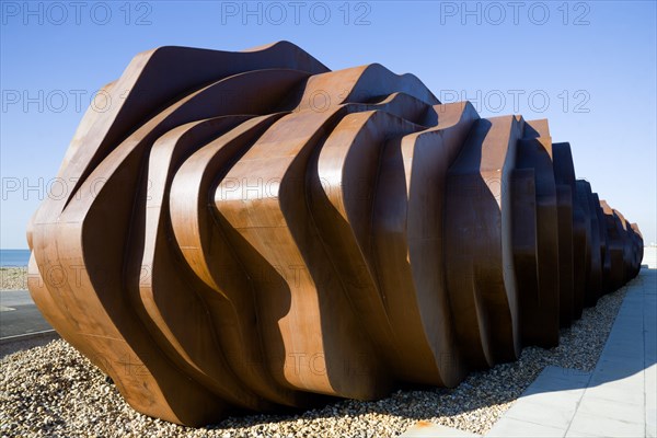 ENGLAND, West Sussex, Littlehampton, The rusted metal structure of the fish and seafood restaurant the East Beach Cafe designed by Thomas Heatherwick on the promenade