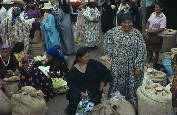 VENEZUELA, Zulia Province, Paraguaipoa, Guajiro Indian women at street market. Wayu Wayœu Wahiro Amerindian Colombia-Venezuelan border