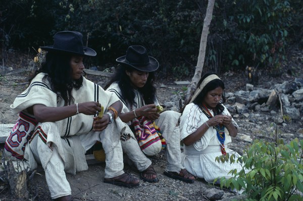 COLOMBIA, Sierra Nevada de Santa Marta, Ika, Ika  children of the Chaparro family beside grave of their father an Ika leader murdered by paramilitaries linked to the Colombian Army. Arhuaco Aruaco indigenous tribe mourning funeral death American Colombia Dad Hispanic Indegent Kids Latin America Latino Religion South America  Arhuaco Aruaco indigenous tribe mourning funeral death American Columbia Dad Hispanic Indegent Kids Latin America Latino Religion South America Religious