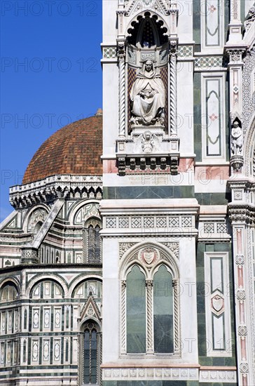 ITALY, Tuscany, Florence, "The Neo-Gothic marble west facade of the Cathedral of Santa Maria del Fiore, the Duomo, with Brunellaschi's Dome beyond"