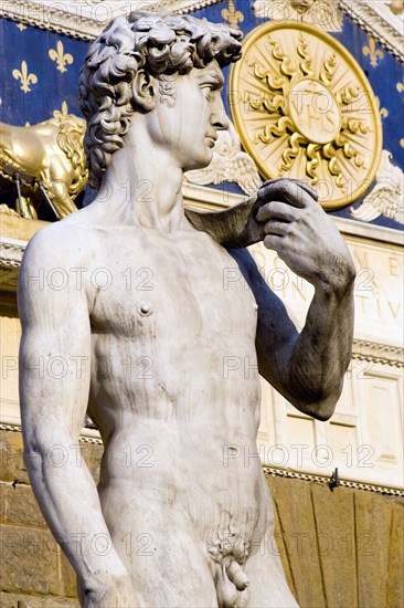 ITALY, Tuscany, Florence, The copy of the statue of David by Michelangelo standing outside the Palazzo Vecchio in the Piazza della Signoria