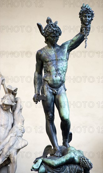 ITALY, Tuscany, Florence, "The copy of the 1554 bronze statue of Perseus holding Medusa's head by Cellini in the Loggia del Lanzi, or Loggia di Orcagna in the Piazza della Signoria"
