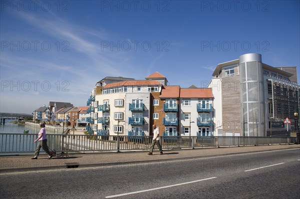 ENGLAND, West Sussex, Shoreham-by-Sea, Ropetackle modern housing development apartments on the banks of the river Adur seen from the Norfolk bridge. A regenerated brownfield former industrial area.