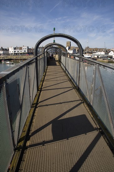 ENGLAND, West Sussex, Shoreham-by-Sea, Footbridge across the river Adur linking the town centre with Shoreham Beach.