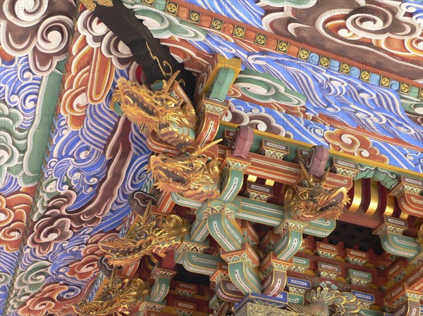 JAPAN, Honshu, Tokyo, "Chiba, Narita. Narita-san Temple, beside main temple, three story pagoda, 1803 restoration, Edo-era traditional decoration under eaves"