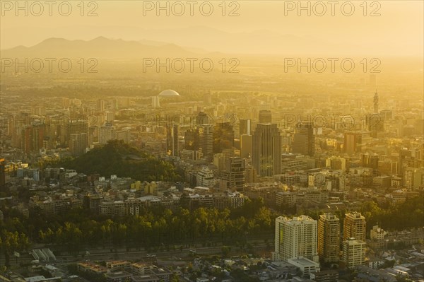 CHILE, Santiago, City view at sunset from Cerro San Cristobal. Jon Hicks.