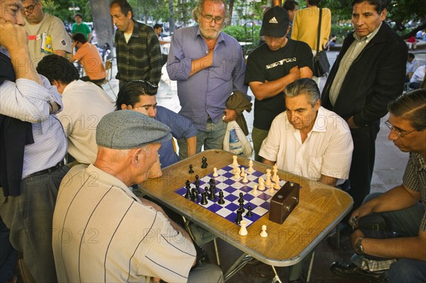 CHILE, Santiago, Playing chess in the Plaza de Armas.