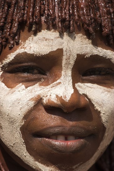 ETHIOPIA, Omo Valley, Mago National Park, "Banna woman, her hair greased with ocher colouring and animal fat into plaits known as Goscha "