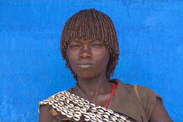 ETHIOPIA, Lower Omo Valley, Key Afir, Banna woman at weekly market