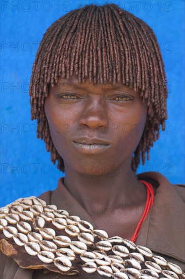 ETHIOPIA, Lower Omo Valley, "Key Afir,", Banna woman at weekly market