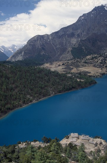 NEPAL, Lower Dolpo Trek, Phoksumdo, View south west over Pal Sentan Thasoon Chholing Monastery and Phoksumdo Lake