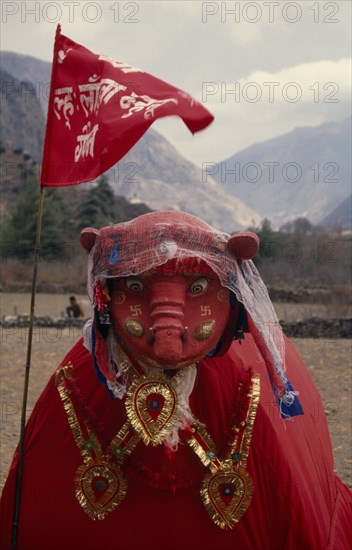 NEPAL, Annapurna Region, Larjung, Circuit Trek. Red painted animal totem representing the God of the Gauchan clan of the Thakalis during the Lha Phewa Festival in Larjung village